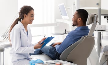 female dentist discussing options with a patient