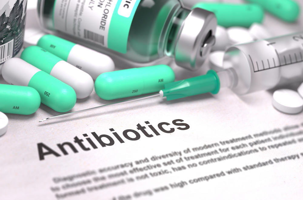 antibiotic pills laying on paper