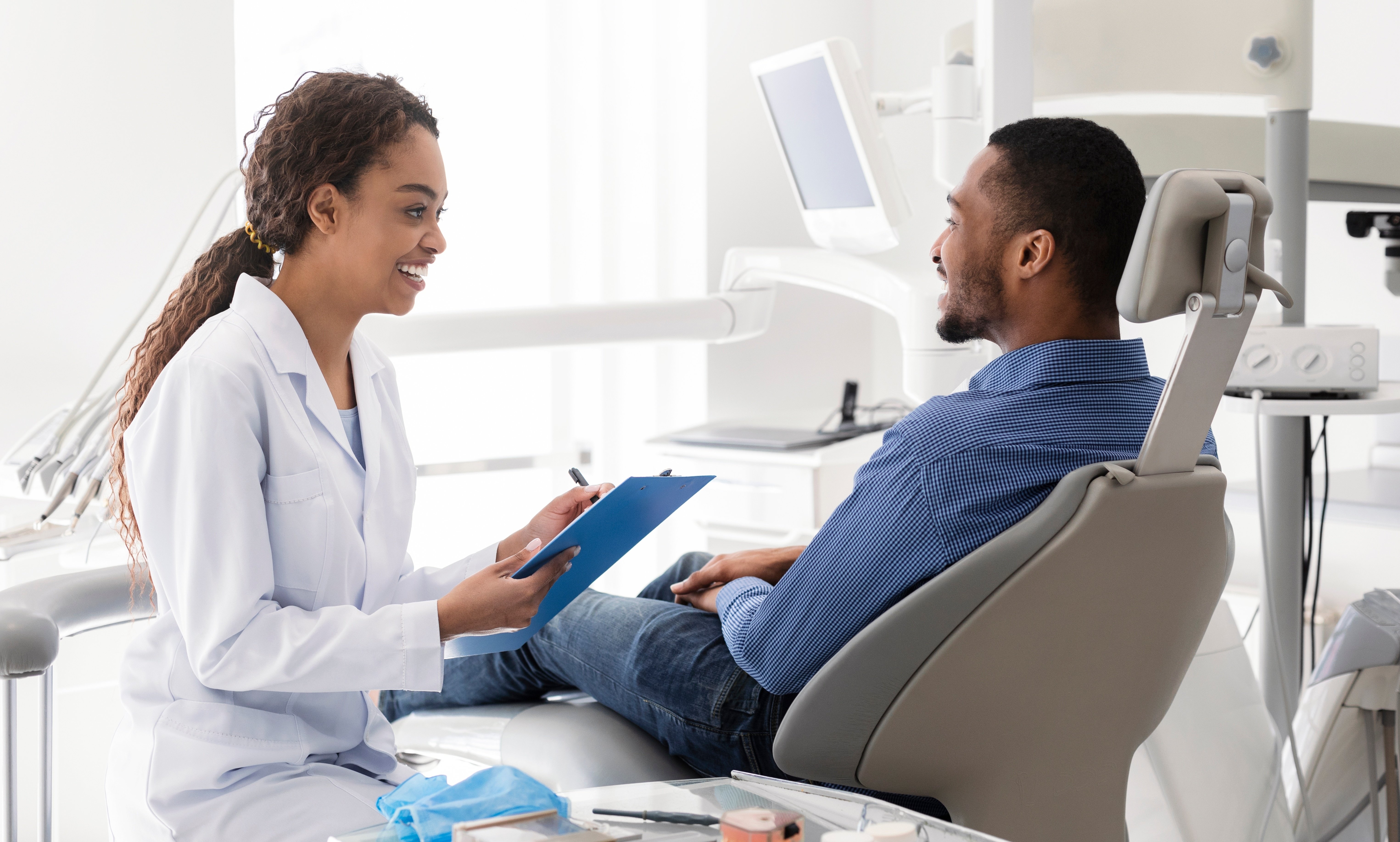 female dentist discussing options with a patient