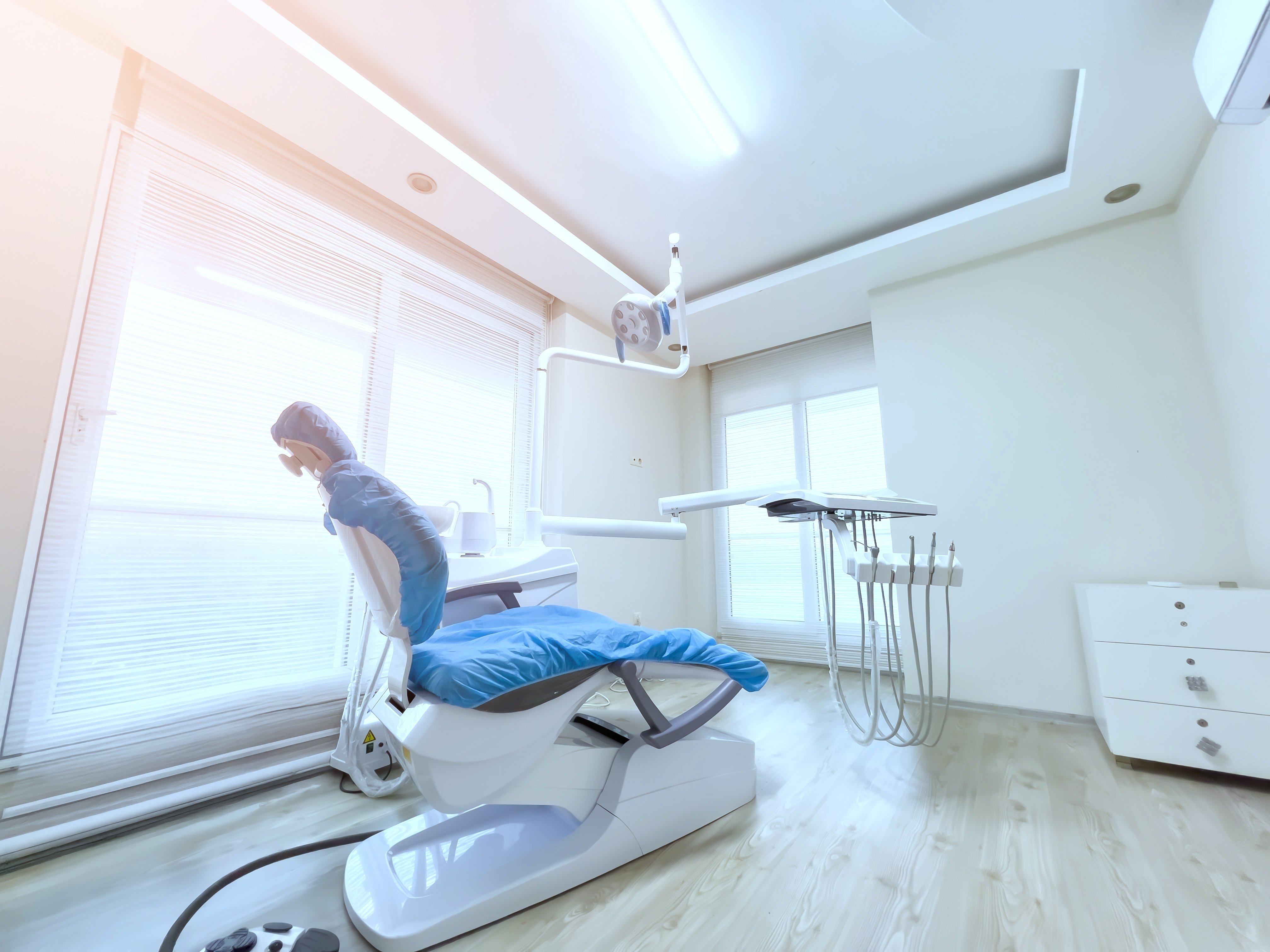 empty dentist chair in a dentist office